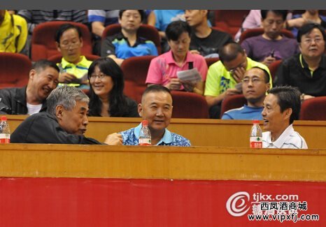 中国乒协副主席陆元盛、西安市乒协主席雷田与陕西禧福祥品牌运营有限公司董事长王延安